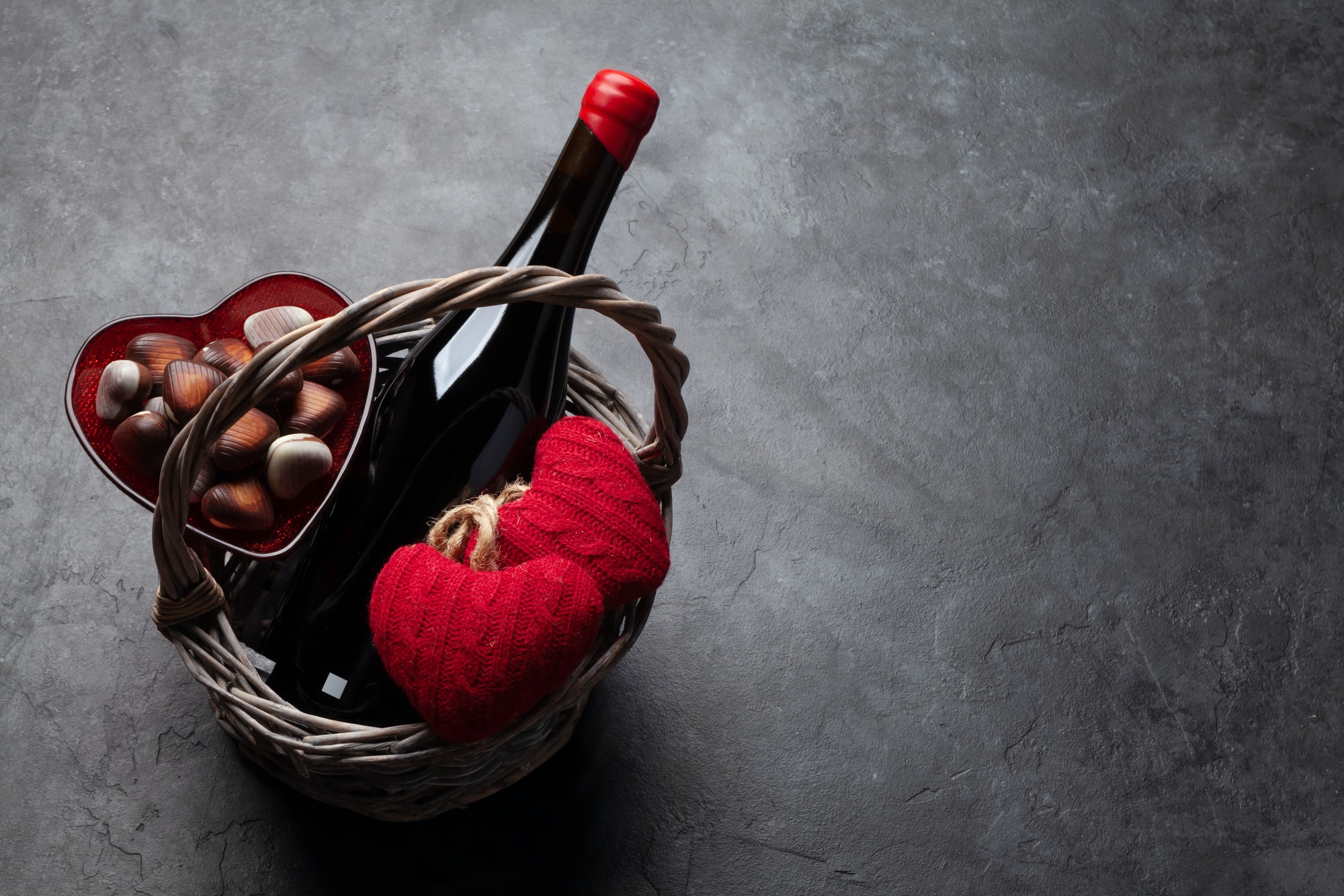 Valentines day basket with wine and chocolate